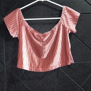 Pink stripey cropped shirt.